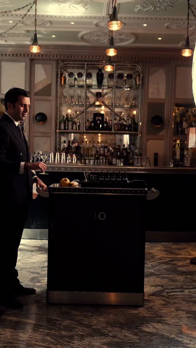 Giorgio and I casually making a drink at bar.